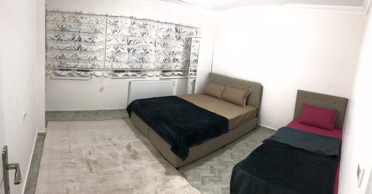 ウスパルタ Derin Apartアパートホテル エクステリア 写真