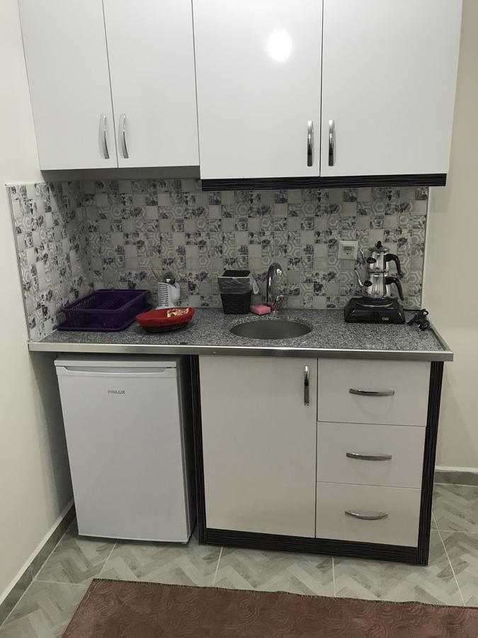 ウスパルタ Derin Apartアパートホテル エクステリア 写真